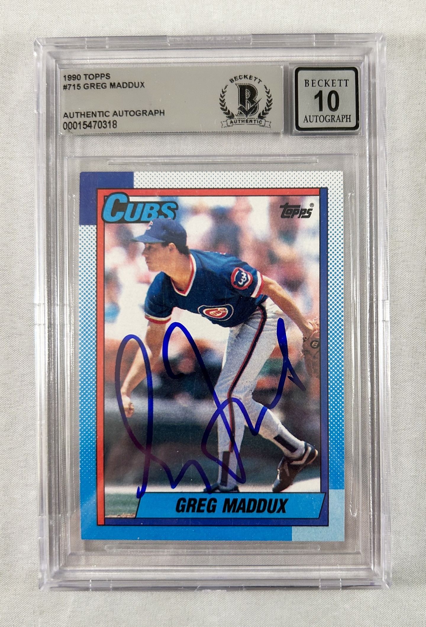 Greg Maddux Signed Trading Card 1990 Topps #715 Beckett BAS