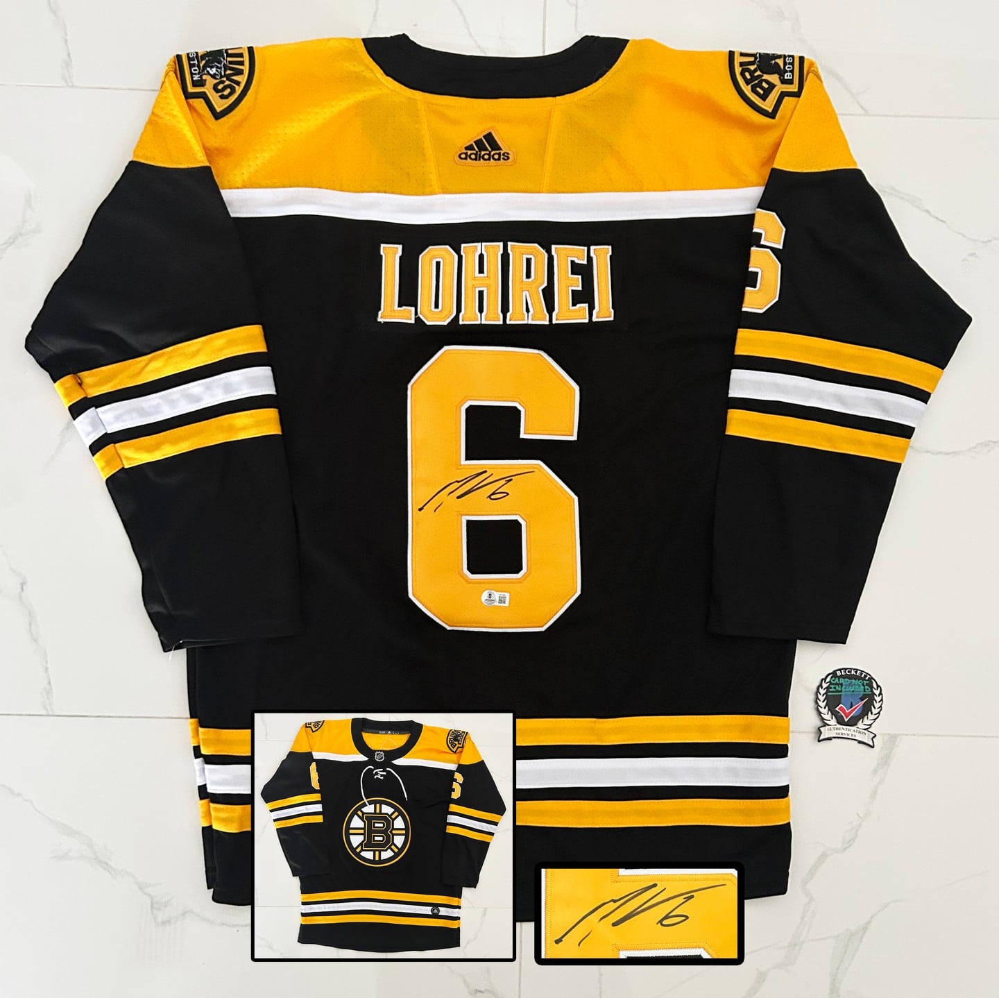 Mason Lohrei Signed Jersey Boston Bruins Beckett BAS 1