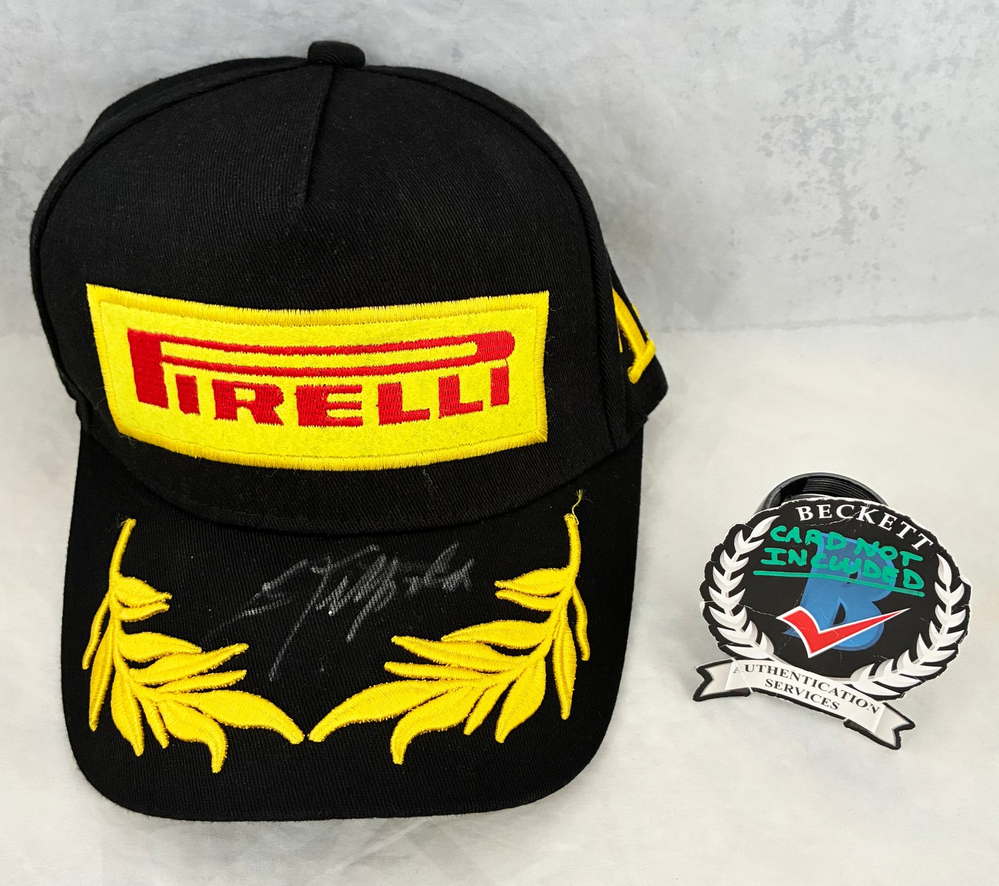 Emerson Fittipaldi Signed Hat Pirelli McLarenFormula 1 F1 Beckett BAS 1